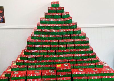 A pyramid of shoeboxes