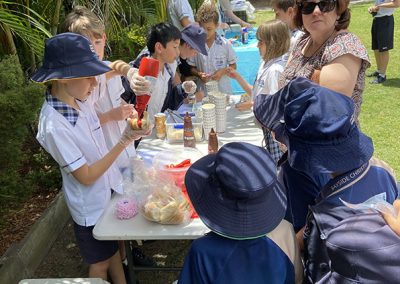 Selling goods at the year 5 market day
