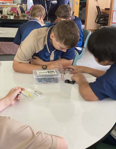 Students learning Arduino